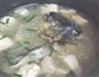 电饭锅煲鱼头豆腐汤的做法图解5