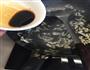 咸菜炒鱿鱼的做法图解7